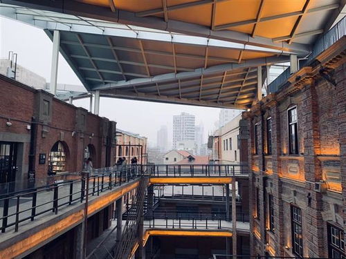 荊楚地理 尊重遺產(chǎn)建筑式修繕讓聯(lián)合國教科文組織點贊 平和打包廠 115年斑駁紅墻變身文化新符號